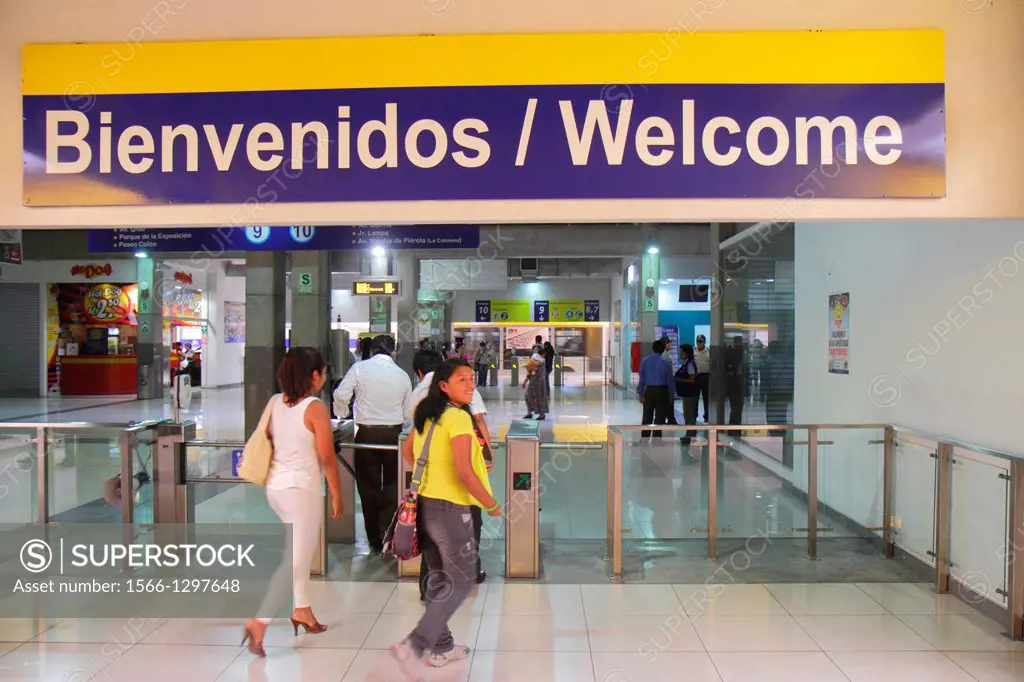 Peru, Lima, Paseo de la Republica, Estacion Central, station, hub, Metropolitano Bus Line, public transportation, Hispanic, woman, commuter, entering,...
