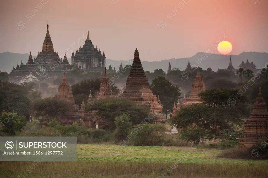 Ananda Temple on left and Thatbyinnyu Temple adjacent to Ananda Temple, at sunset, Bagan, Myanmar, (Burma).
