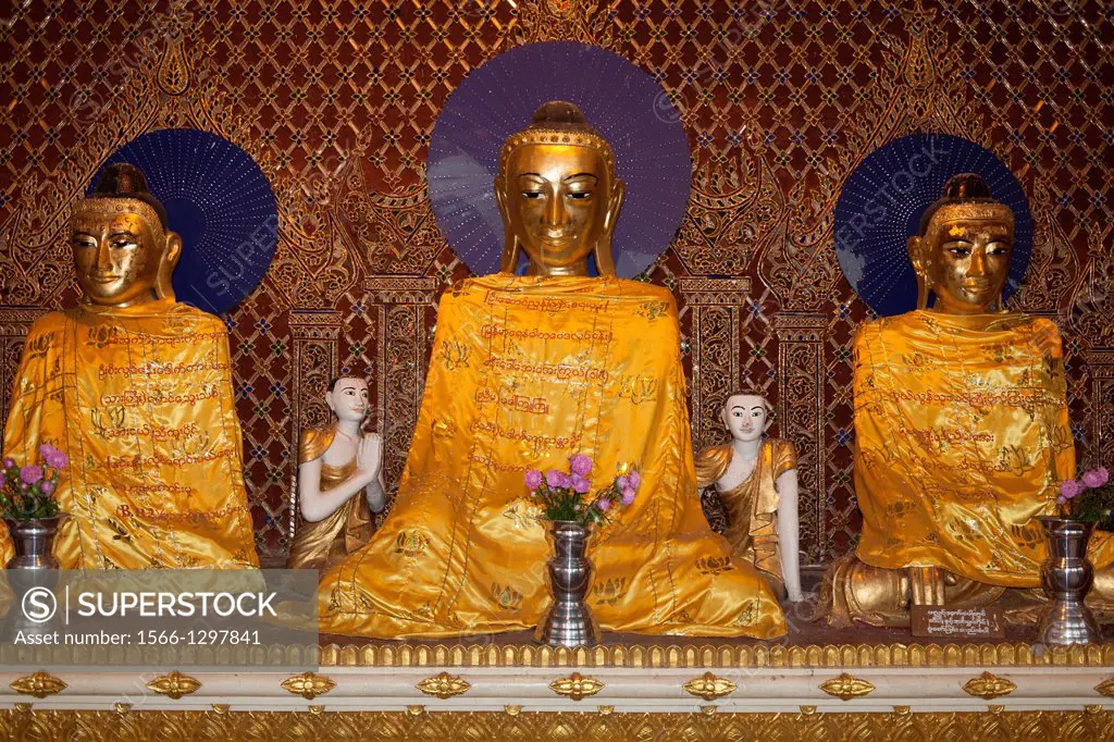 Buddha statues at Shwedagon Pagoda, Yangon, (Rangoon), Myanmar, (Burma).