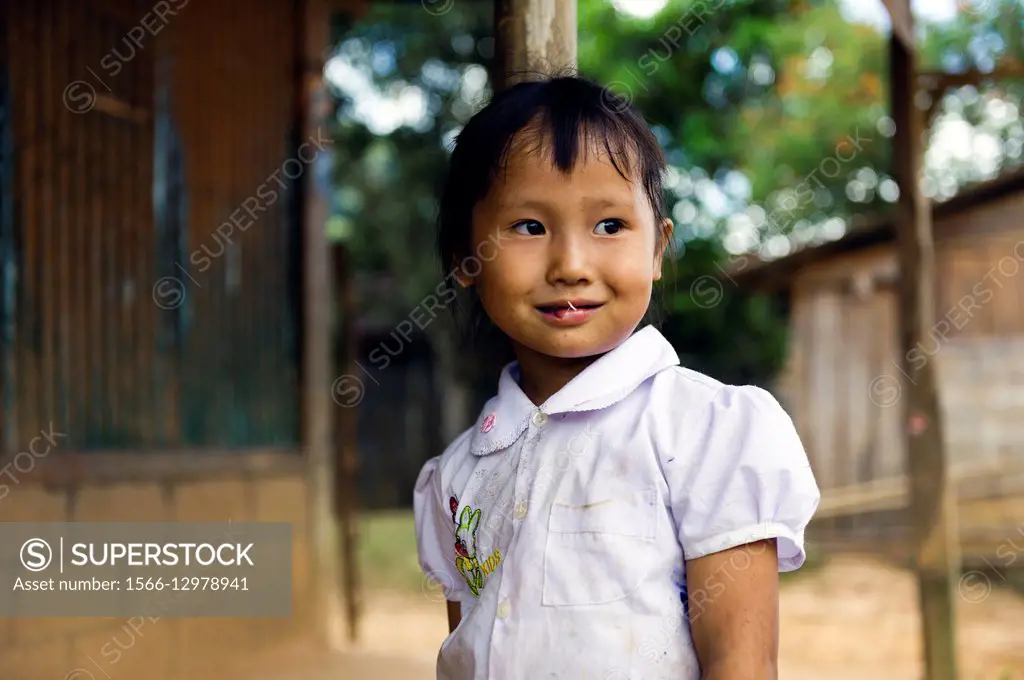 Asia. South-East Asia. Laos. Province of Vang Vieng. Rural village. Portrait of a Lao little girl.