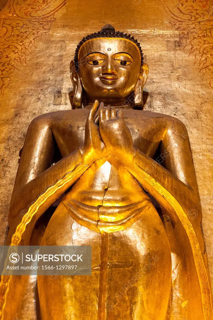 Large golden Kassapa Buddha inside Ananda Temple, Old Bagan, Bagan, Myanmar, (Burma).