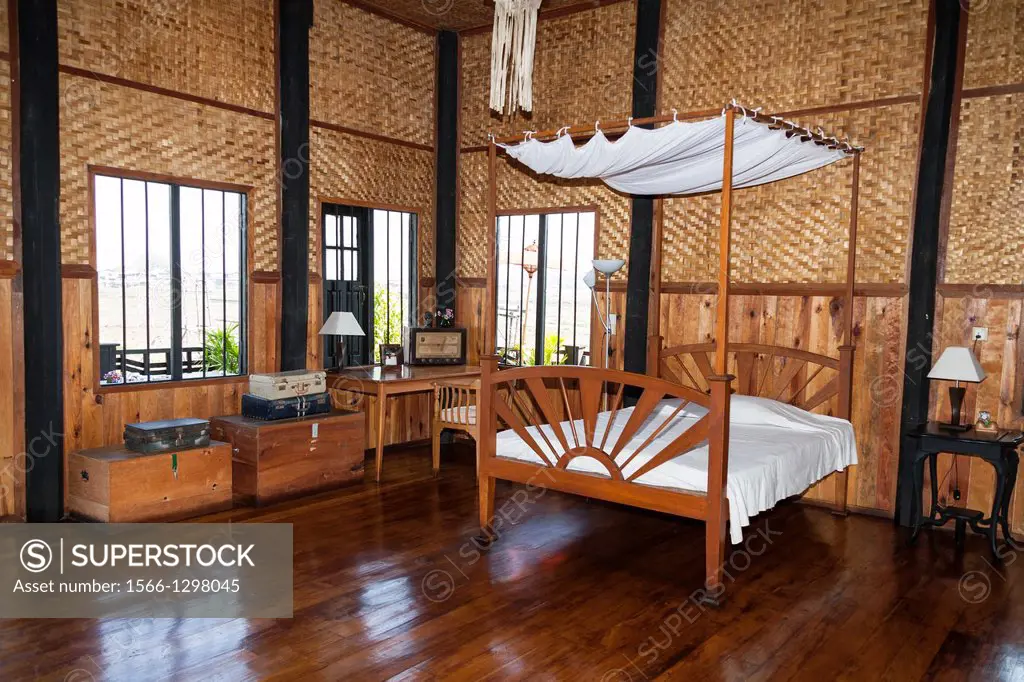 Bedroom inside the Inthar Heritage House, Inpawkhon Village, Inle Lake, Shan State, Myanmar, (Burma).