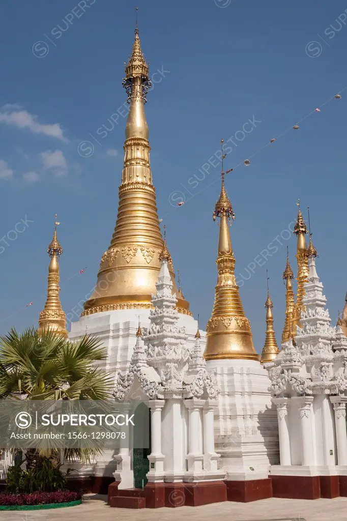 White and golden stupas at Shwedagon Pagoda, Yangon, (Rangoon), Myanmar, (Burma).