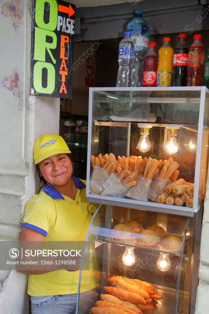Peru, Lima, Jiron de la Union, kiosk, doorway shop, business, vendor, churro, Spanish doughnut, fried-dough, pastry, Hispanic, girl, teen, job, food w...