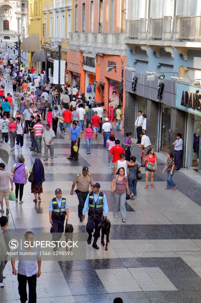 Peru, Lima, Jiron de la Union, historic district, peatonal, promenade, pedestrian mall, shopping, crowded, Hispanic, man, woman, K9 patrol, policeman,...