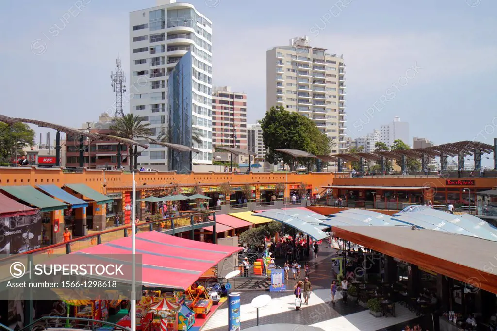 Peru, Lima, Miraflores, Malecon de la Reserva, Larcomar, shopping, dining, lifestyle center, centre, dining, luxury high-rise, building, awning, arcad...
