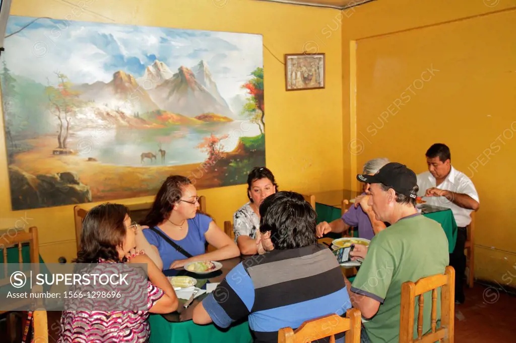 Peru, Tacna, Avenida Francisco Bolognesi, restaurant, business, dining, table, food plates, eating, Hispanic, man, woman, boy, girl, teen, family, dec...