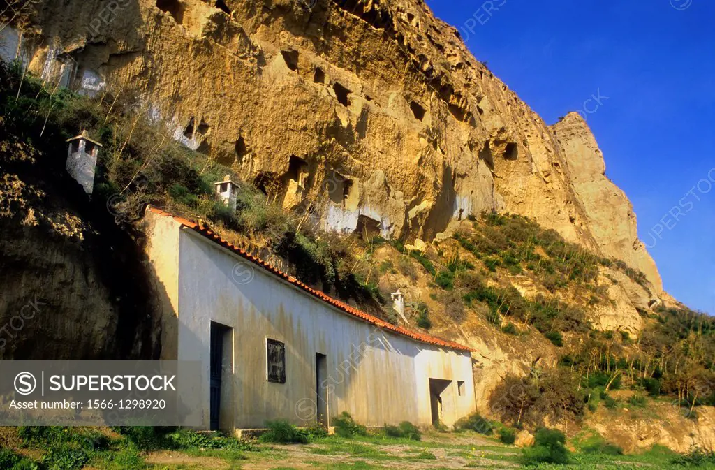 Cave houses at Terrera del Calguerin troglodyte quarter.Cuevas de Almanzora, Almeria province, Andalucia, Spain.