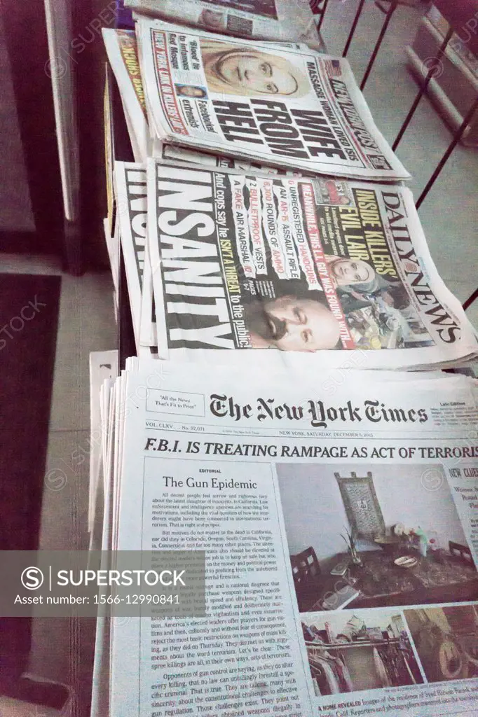 Copies of the New York Times on a newsstand contain the first front-page editorial the Times has run since 1920, seen on Saturday, December 5, 2015. T...