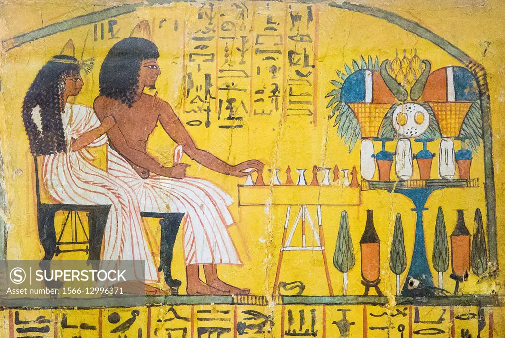 Egypt, Cairo, Egyptian Museum, from the tomb of Sennedjem, Deir el Medina : Door panel (recto), Sennedjem following by his wife is playing the Senet g...