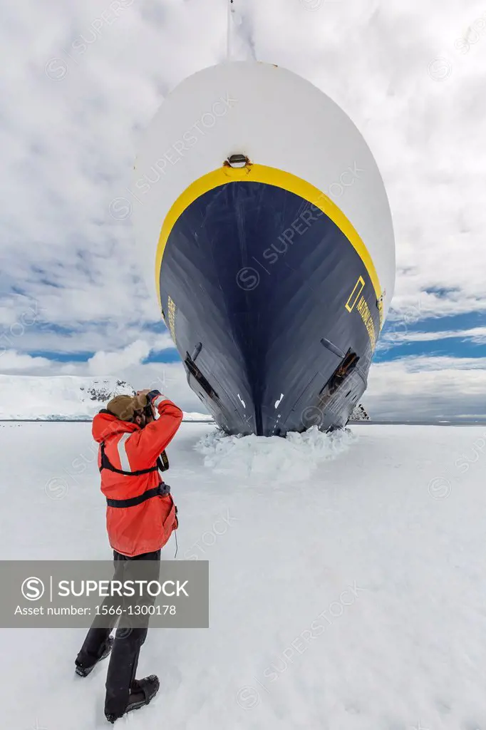 Staff from the Lindblad Expedition ship National Geographic Explorer (shown here is Photo Instructor Eric Guth) working in Antarctica.