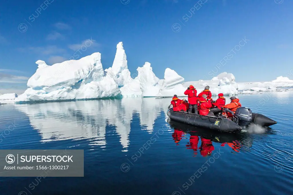 Guests from the Lindblad Expedition ship National Geographic Explorer enjoy the Yalour Islands, Antarctica by Zodiac.