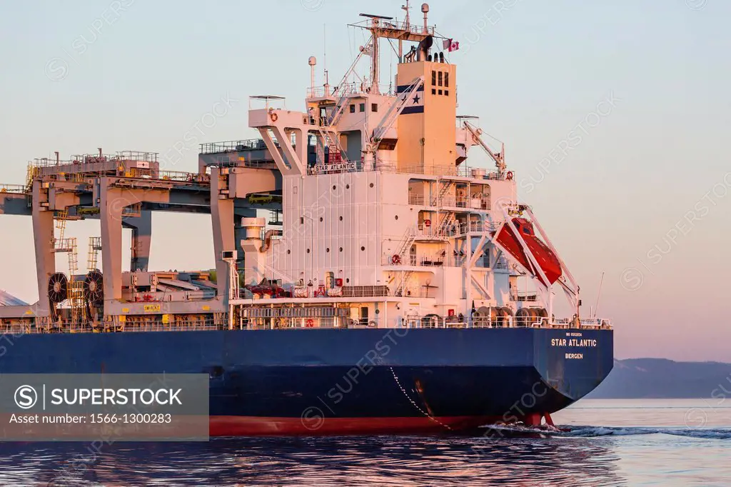 Commercial tanker at sunset, Haro Strait, San Juan Islands, Washington, U.S.A.