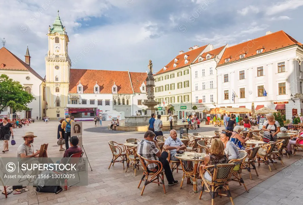 Old Town main square with people at a street cafe. Bratislava, Slovakia.