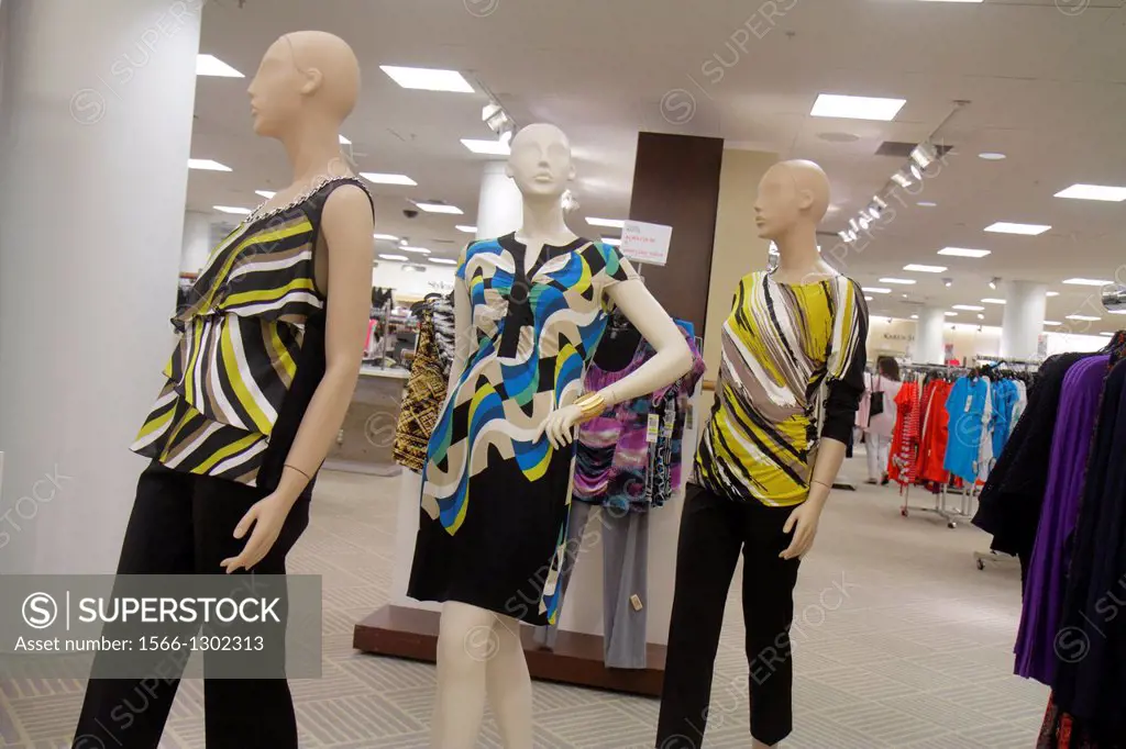 Female shop dummy fashion mannequin in department store boutique
