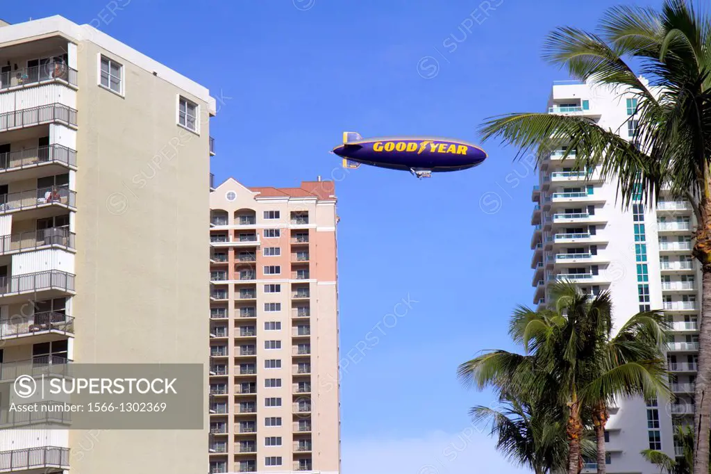Florida, Ft. Fort Lauderdale, high-rise, condominium, buildings, Goodyear blimp, in flight, promoting, icon,.