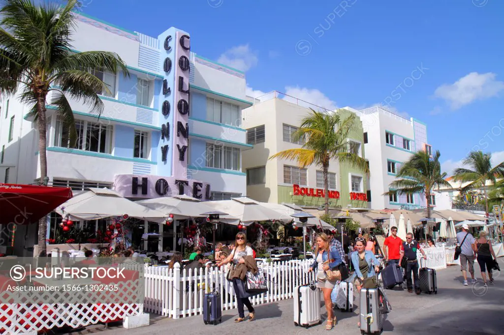 Florida, Miami Beach, Art Deco District, Ocean Drive, hotels, restaurant, alfresco dining, front, entrance, tables, umbrellas, Colony Hotel, Boulevard...