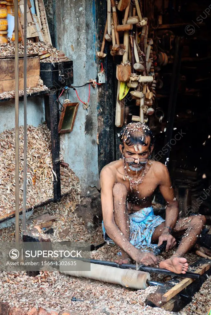 Carpenter at work, Kolkata, India.