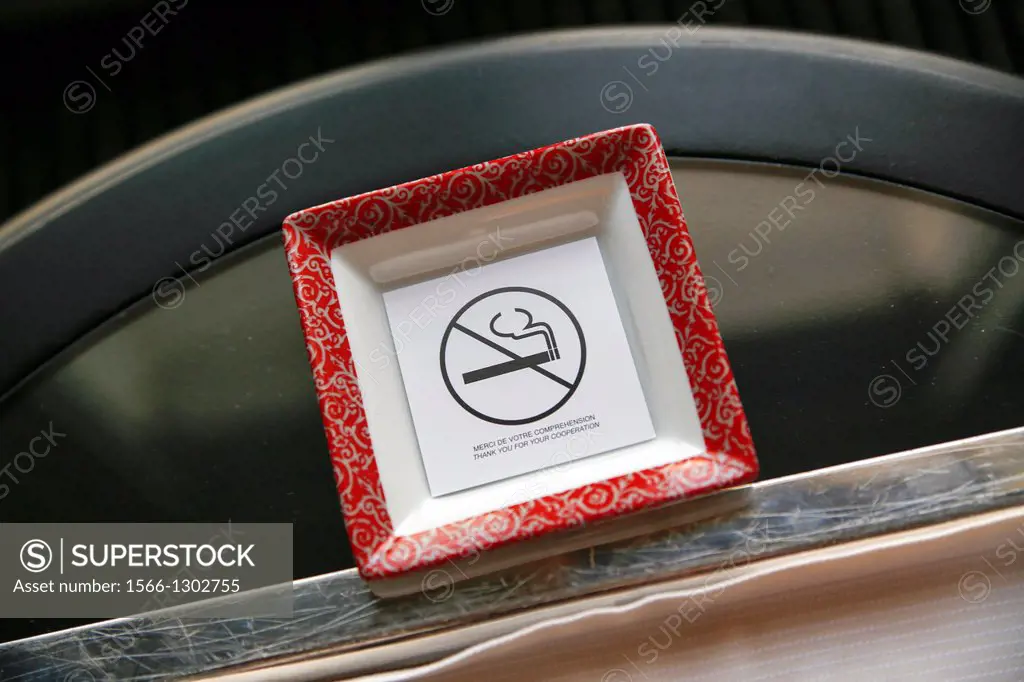 """""No Smoking"" Sign Placed in an Ash Tray.