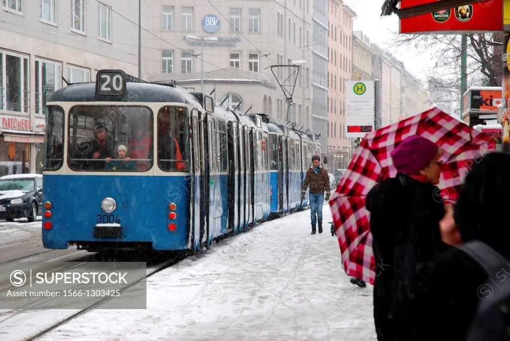 Old tram on a snowy winter day in Munich.