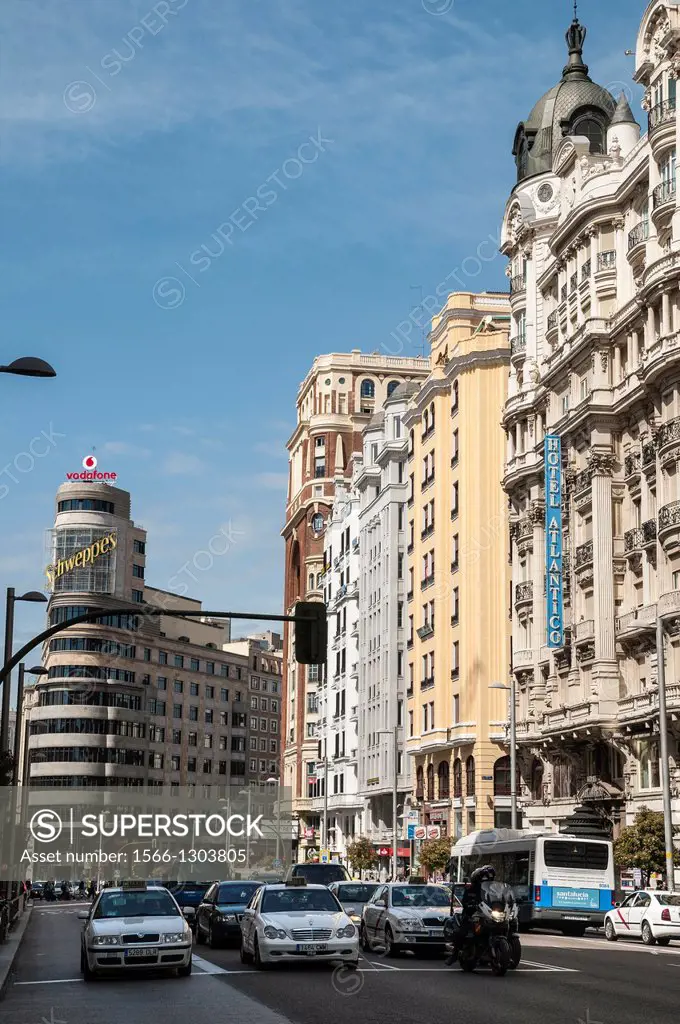 The Gran Via, in the heart of Madrid's shopping and commercial district, with Carrion building (left) and Hotel Atlantico (right) Madrid, Spain.