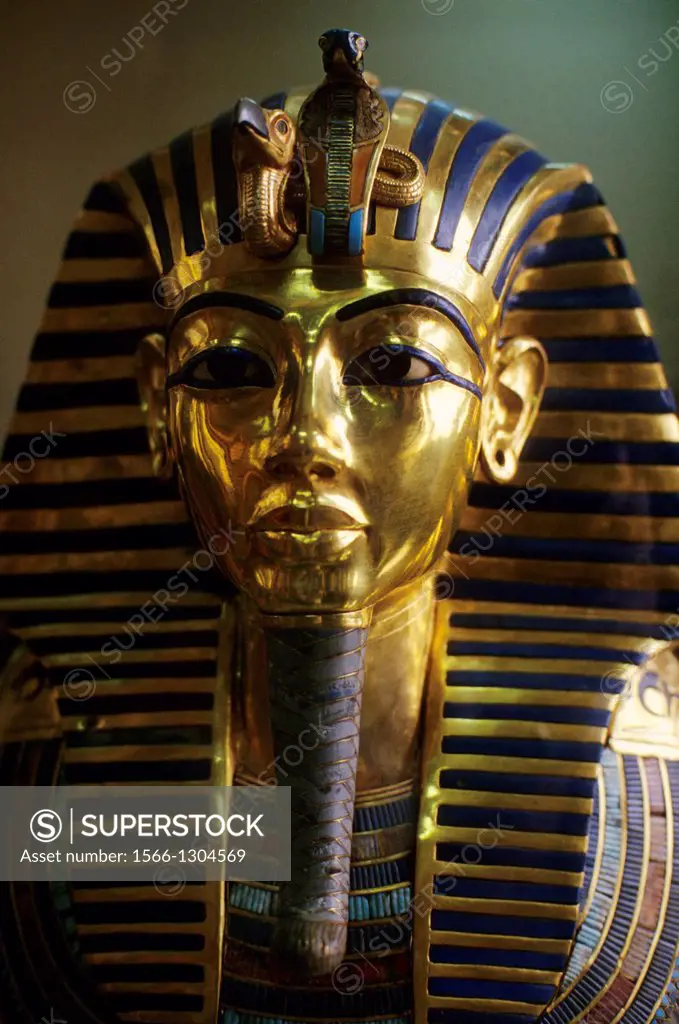 EGYPT, CAIRO, EGYPTIAN MUSEUM OF ANTIQUITIES, TUTANKHAMUN'S GOLD MASK, CLOSE-UP.