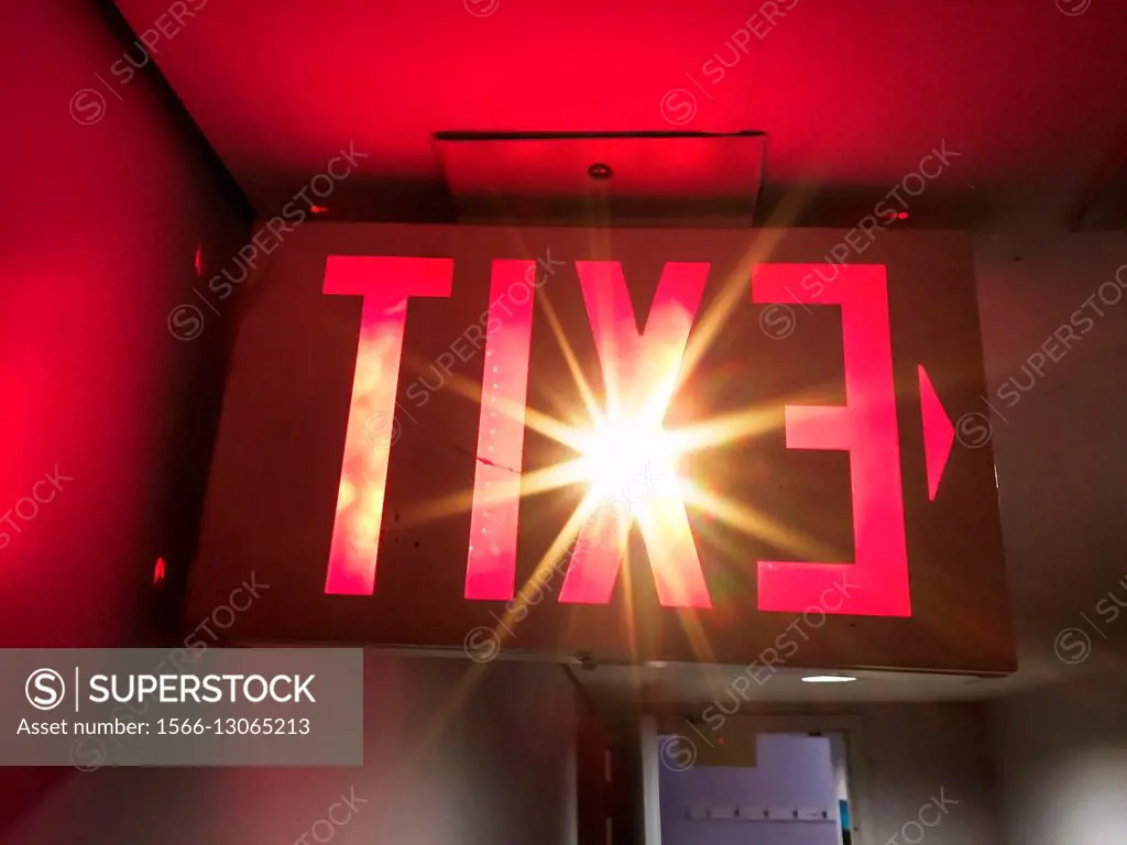 Exit sign with a flare, as seen from the inside looking out, Ontario, Canada
