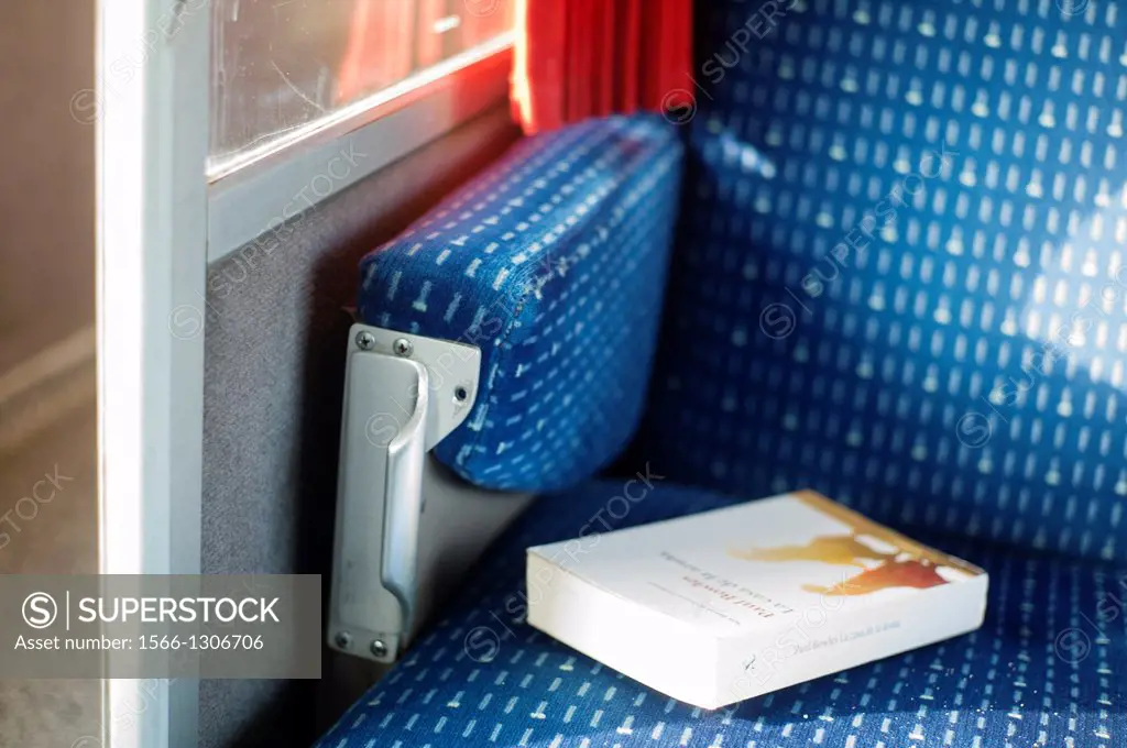 Book on a seat of a train