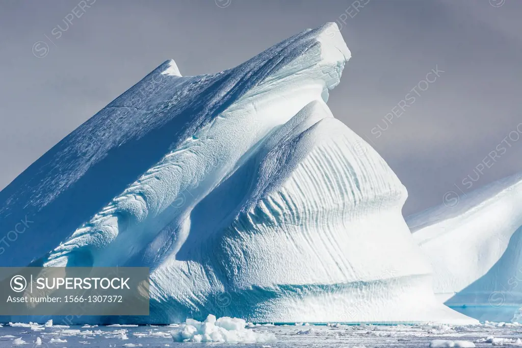 Icebergs near Booth Island, Antarctica, Southern Ocean.