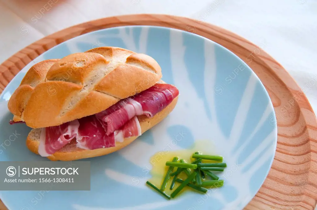 Spanish tapa: Iberian ham sandwich. Spain.