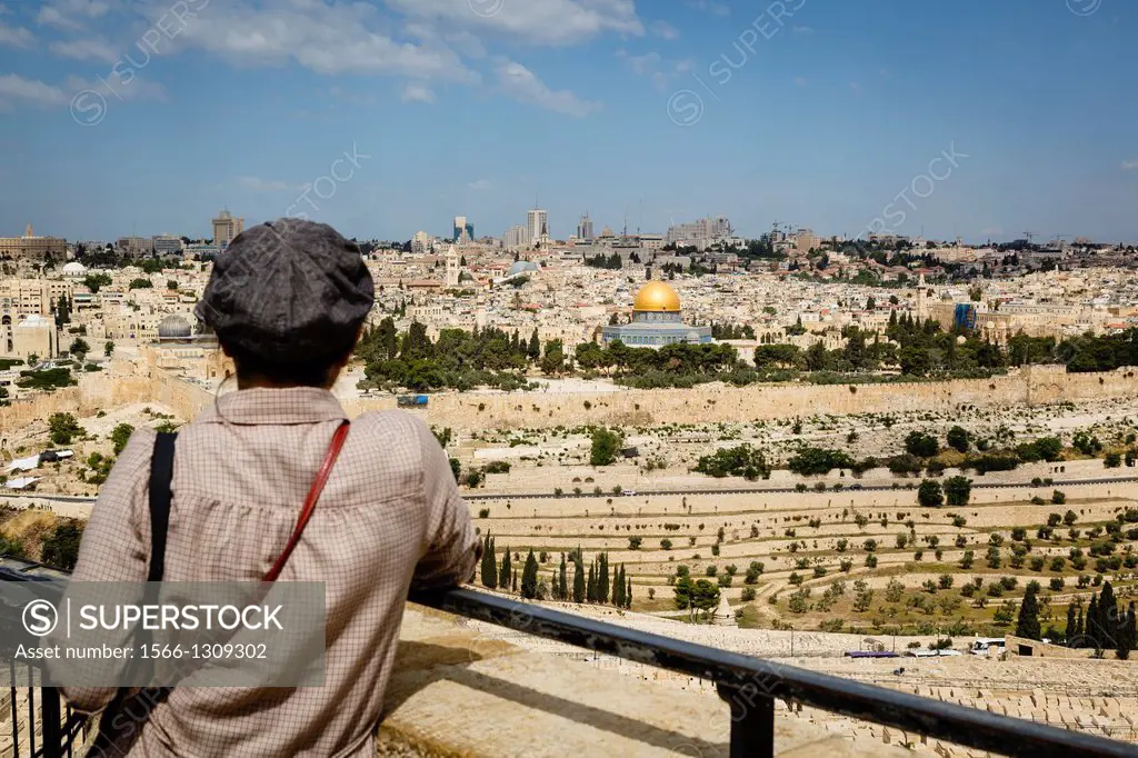View over the old city walls and the dome of the rock mosque from mount of olives, Jerusalem, Israel.