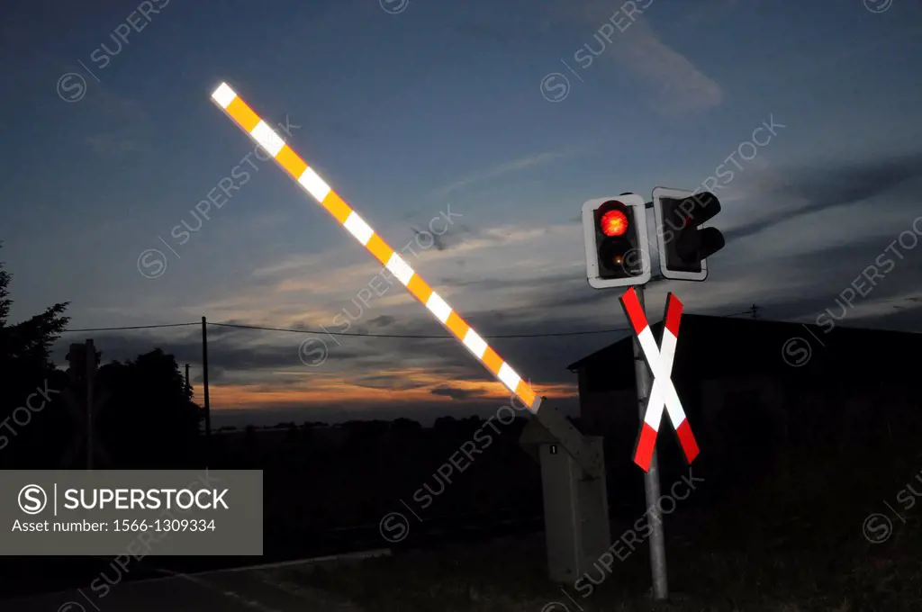 Railroad crossing at night