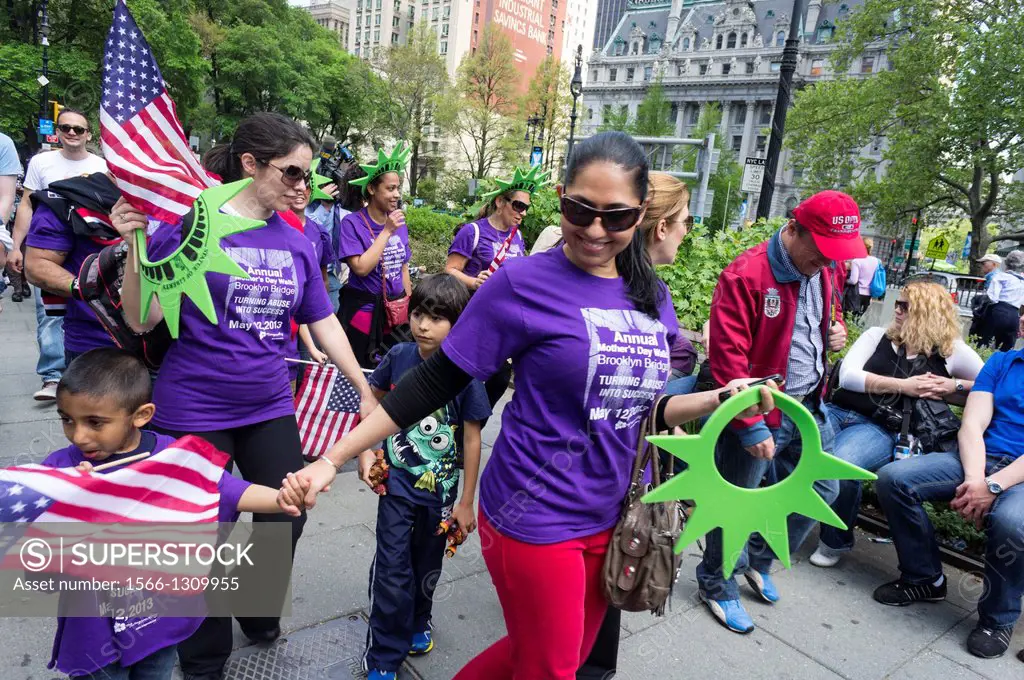 Members and supporters of the group Milagros Day Worldwide participate in their annual Mother´s Day Walk against domestic violence across the Brooklyn...