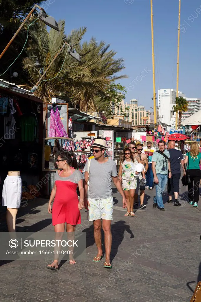 People walking by the promenade, Eilat, Israel.