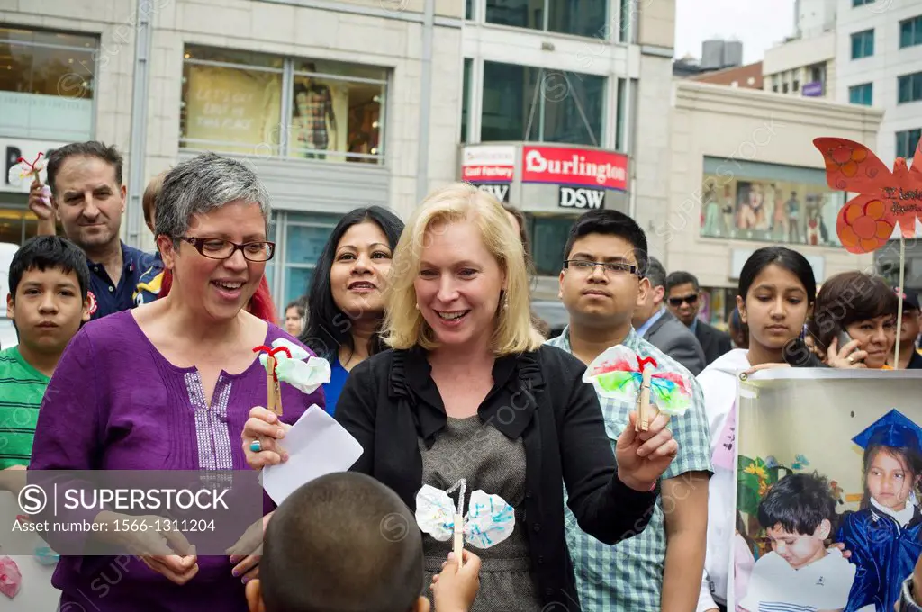 US Senator Kirsten Gillibrand, center, and immigrant families and their supporters rally for immigration reform to keep families together in Union Squ...