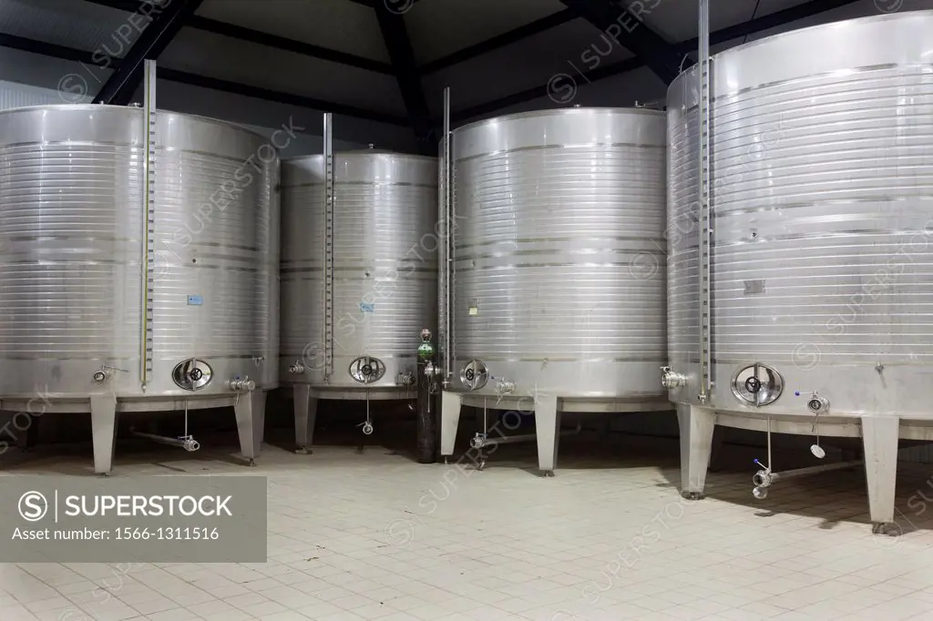 Large tanks of wine.