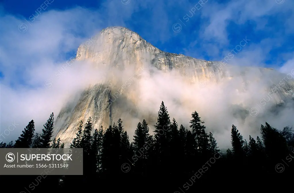 Wispy clouds around El Capitan, Yosemite Valley, Yosemite National Park, California USA.