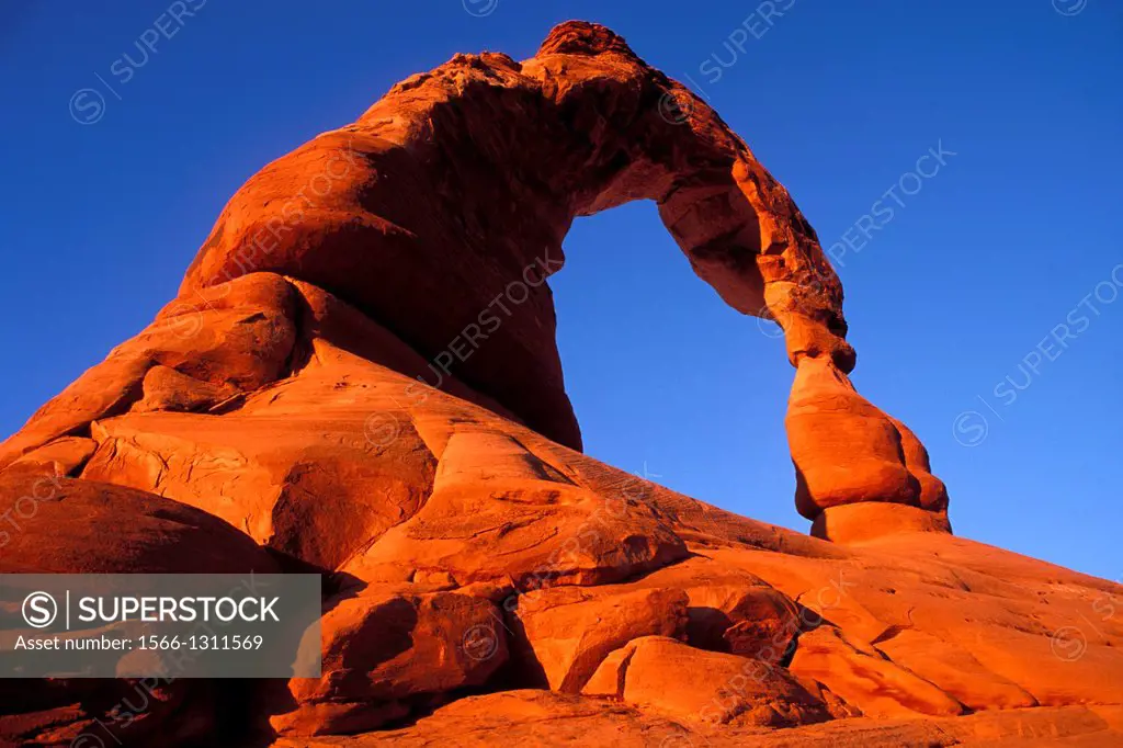 Warm evening light on Delicate Arch, Arches National Park, Utah USA.