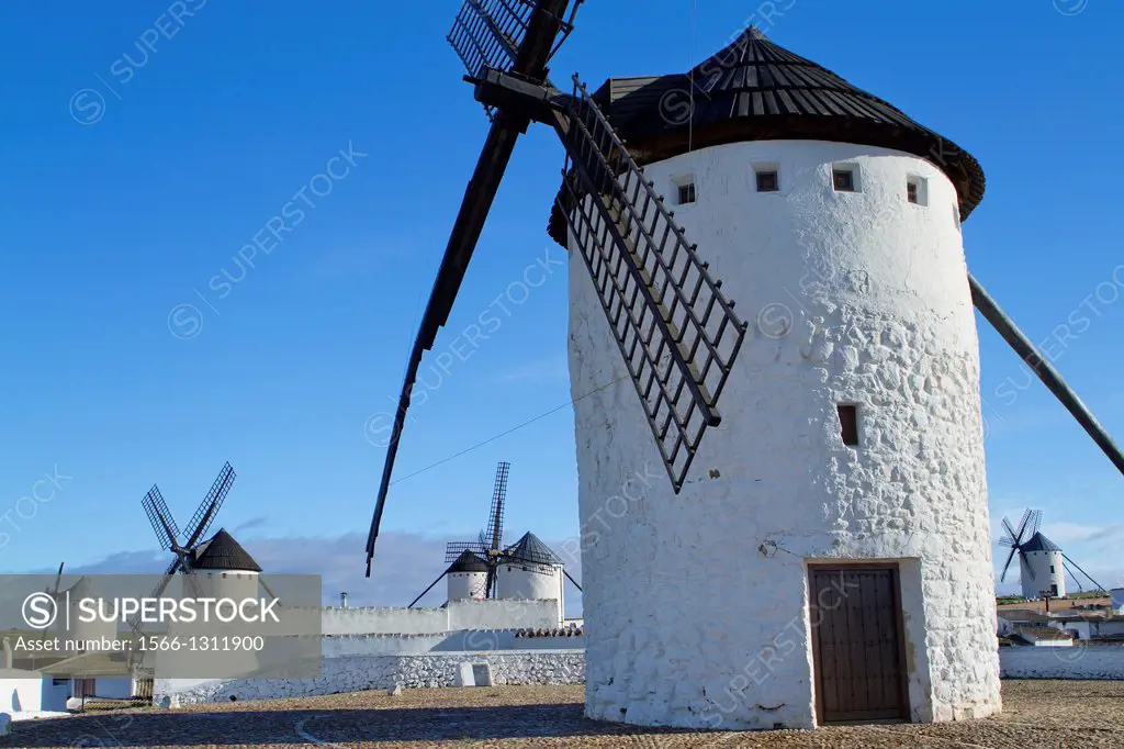 Typical windmills in Campo de Criptana village, in the Route of Don Qiuijote, Ciudad Real province, Castilla-La Mancha, Spain.