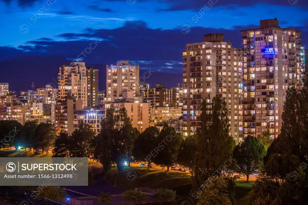 apartment buidings in the West End on the north shore of False Creek at night, Vancouver, BC, Canada.