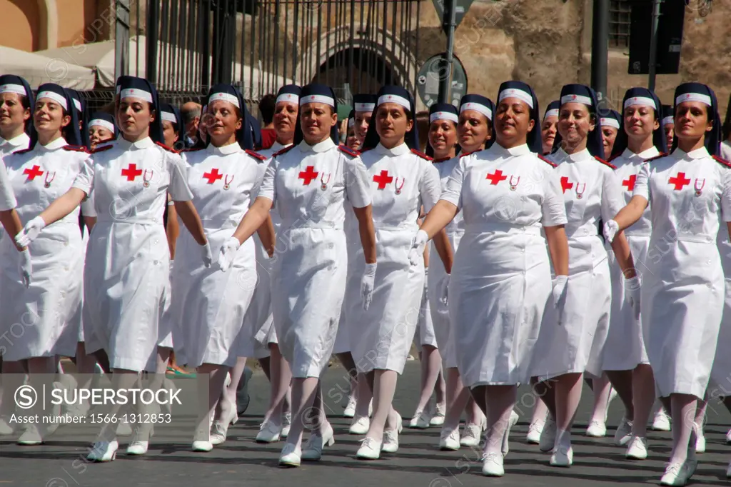 2nd June 2013 - Red Cross nurses marching past the Theatre of Marcellus at the Italian Republic Day parade in rome italy.