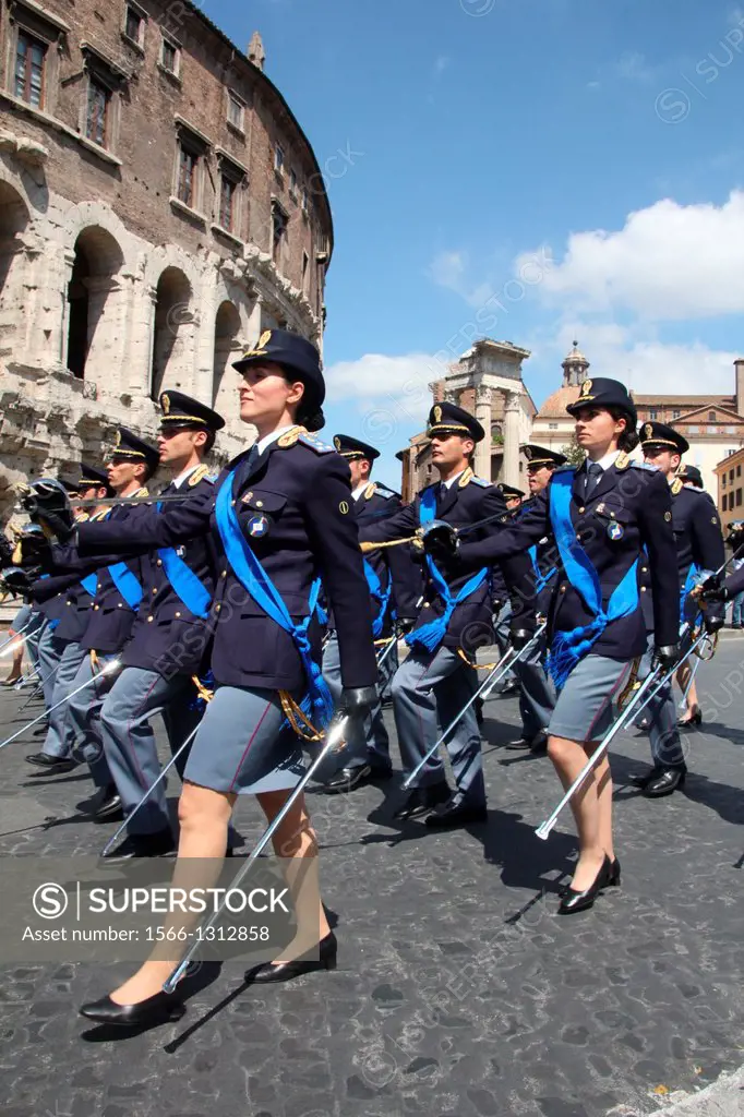 2nd June 2013 - police women marching past the Theatre of Marcellus at the Italian Republic Day parade in rome italy.