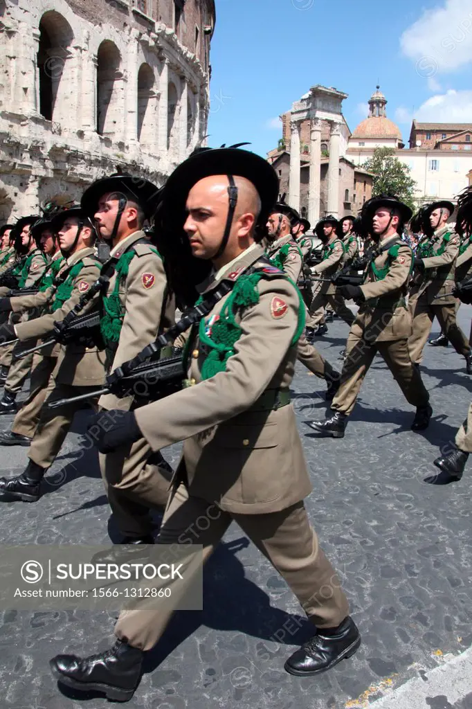 2nd June 2013 - Soldiers marching past the Theatre of Marcellus at the Italian Republic Day parade in rome italy.
