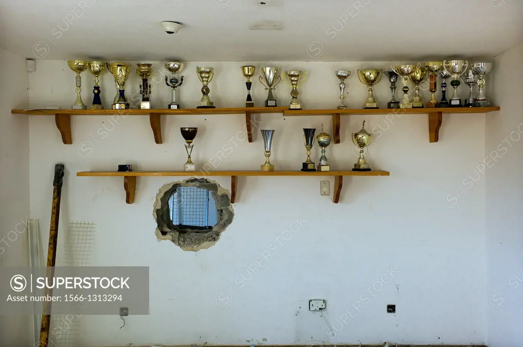  trophies on a shelf in a room abandoned in a football stadium in Palma de Mallorca, Balearic Islands, Spain