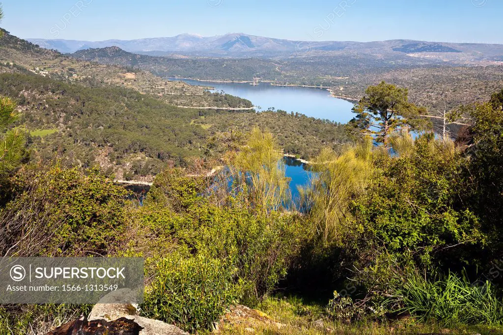 Burguillo reservoir and the Sierra de Gredos from Isiruela port. Avila. Castilla Leon. Spain.