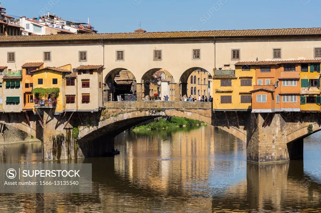 Florence, Florence Province, Tuscany, Italy. The medieval Ponte Vecchio, or Old Bridge, on the Arno River.