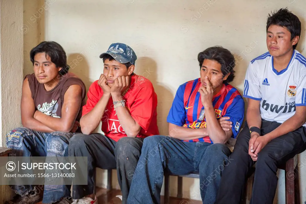 Guatemala, Poaquil, Mayan kids watching TV