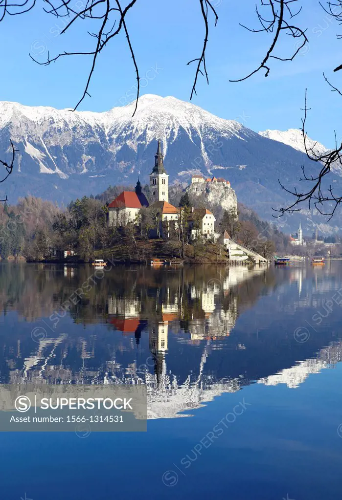 Pilgrimage Church of the Assumption of Mary on Bled Island and Bled Castle Lake Bled Slovenia.