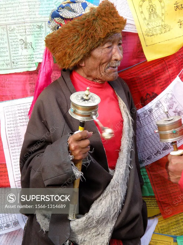 Old man in Jokhang Temple, Lhasa, Tibet, Asia