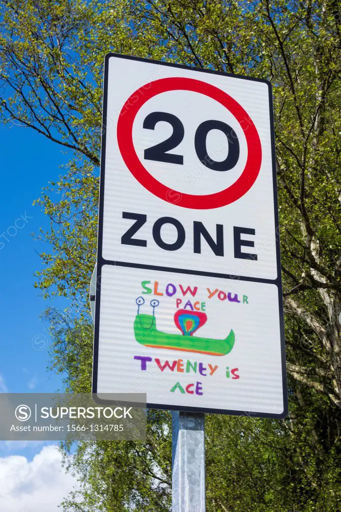 Speed limit road sign near school in England, United Kingdom.